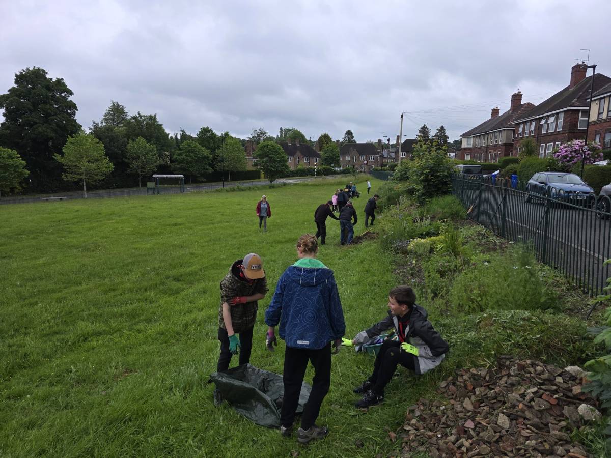 The Cub Pack hard at work with their litter pickers
